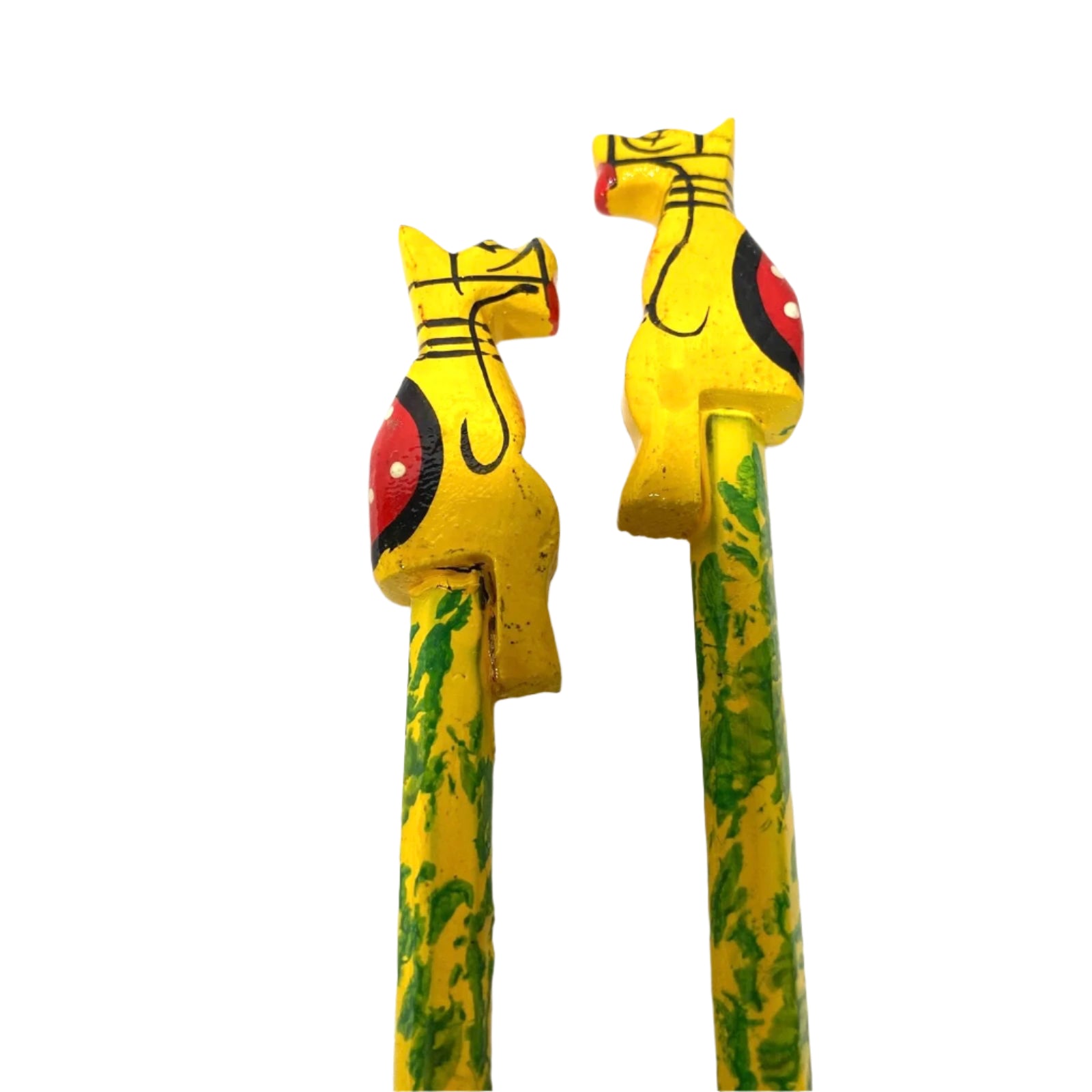 Two colorful wooden toys shaped like animals on a white background