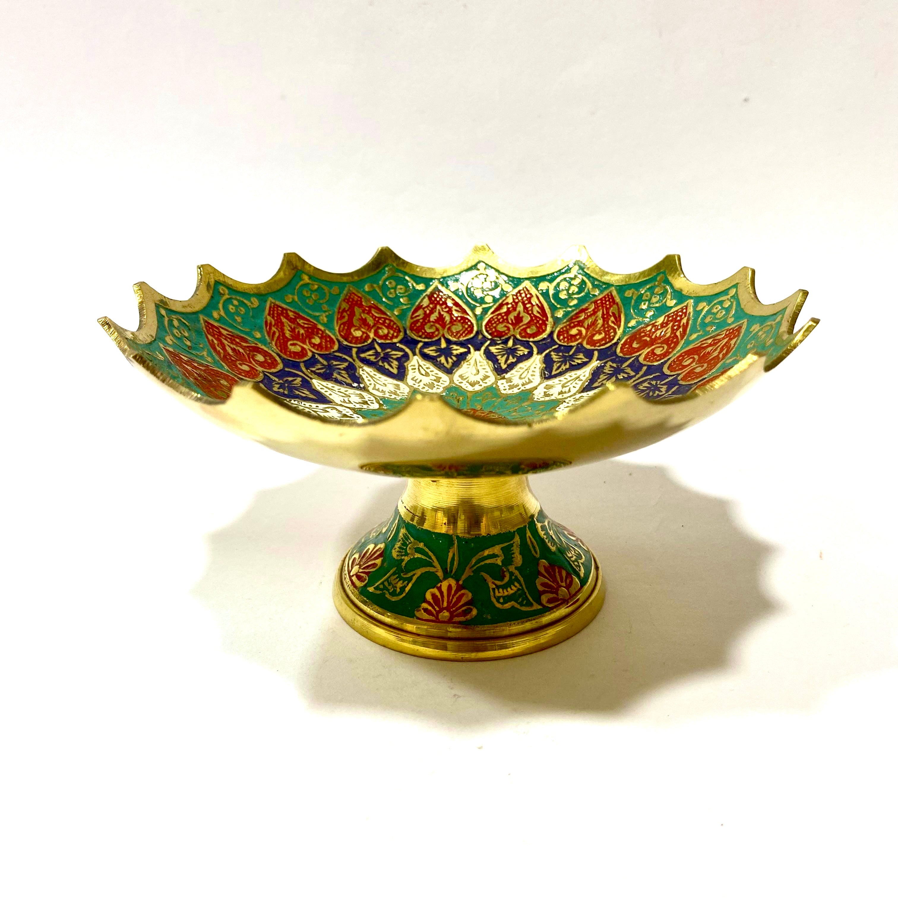Decorative bowl with colorful patterns on a white background