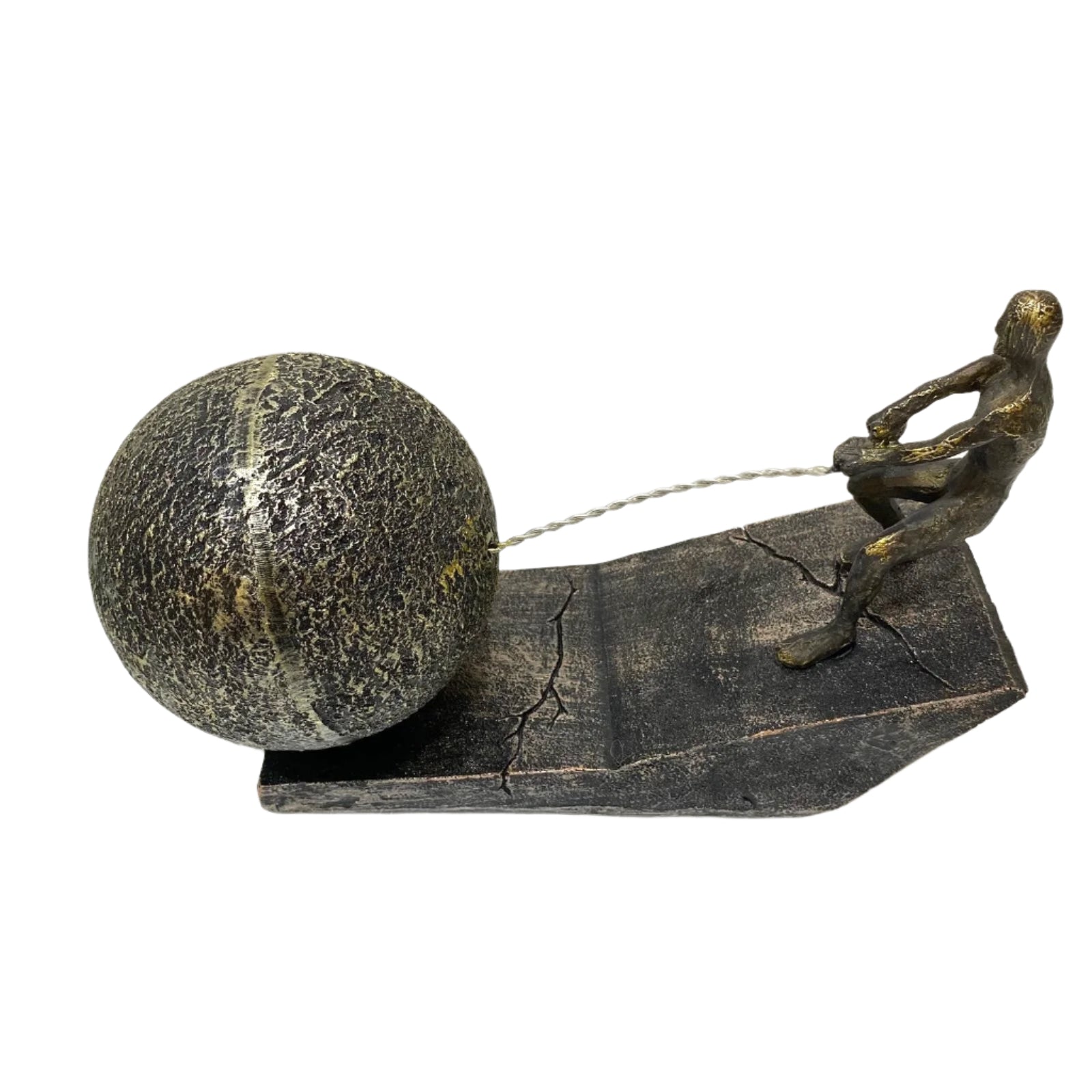 Bronze sculpture of a figure pulling a large ball on a white background