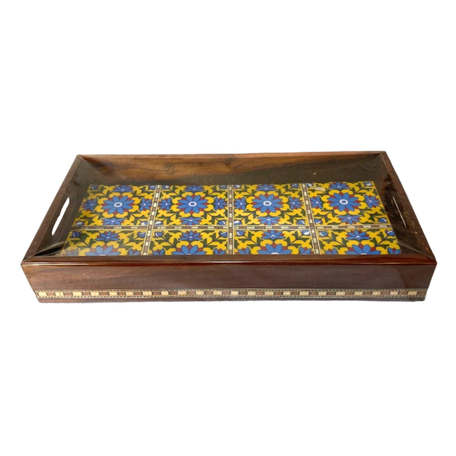 Wooden box with decorative tile lid on a white surface