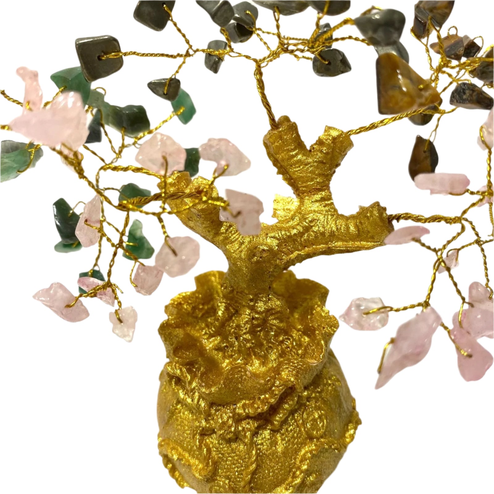 Decorative gold tree sculpture with gemstone branches on a white background