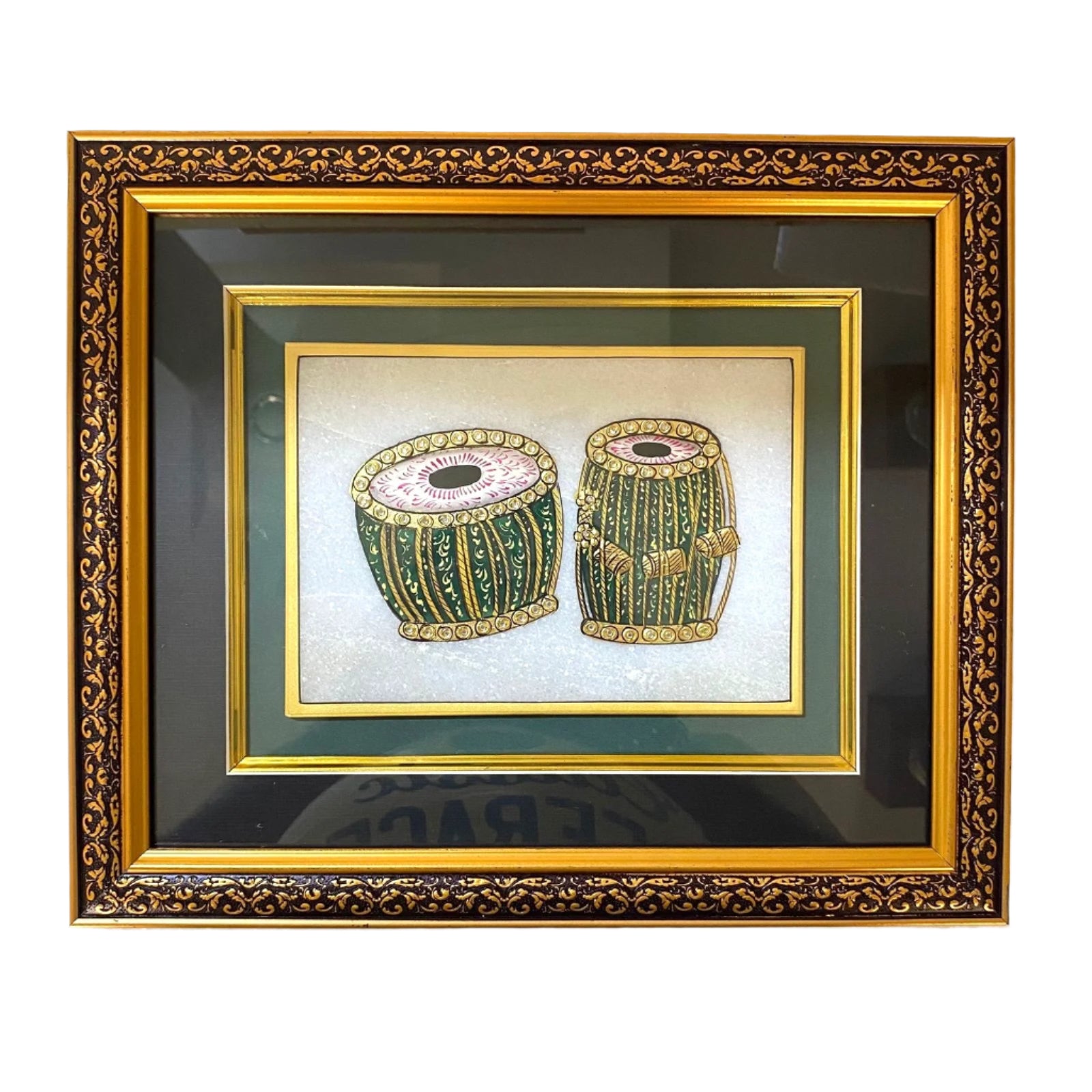 Framed artwork of two drums on a textured surface