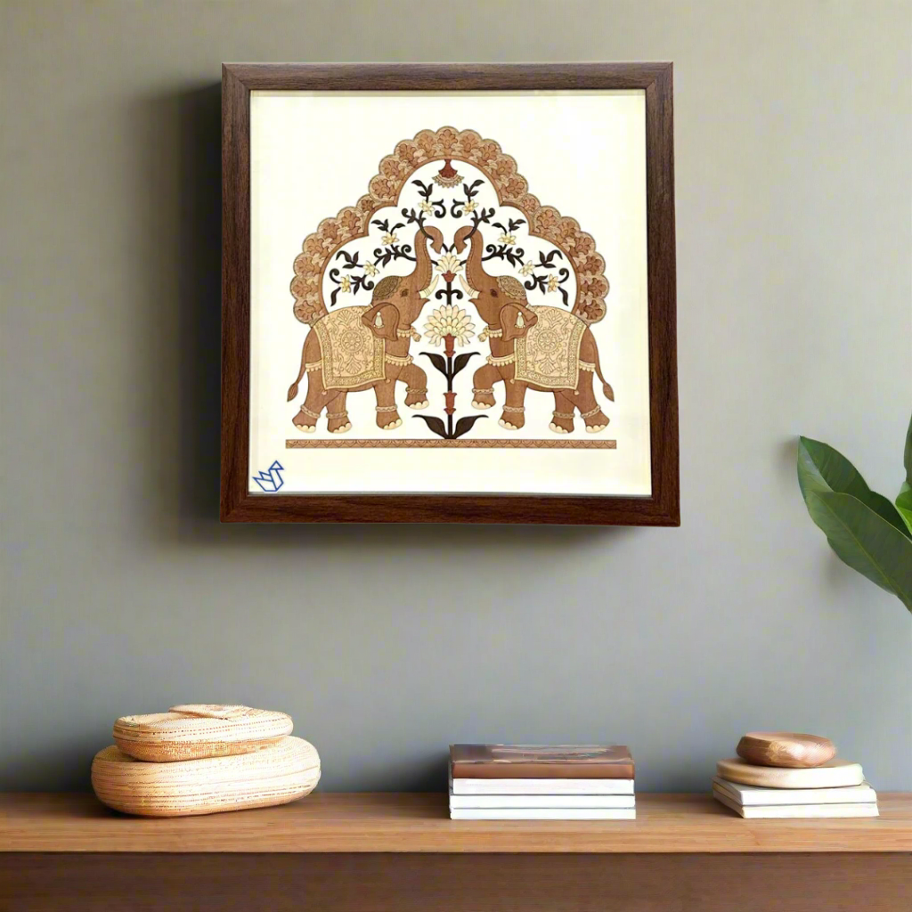 Framed artwork of two elephants under an arch on a white background