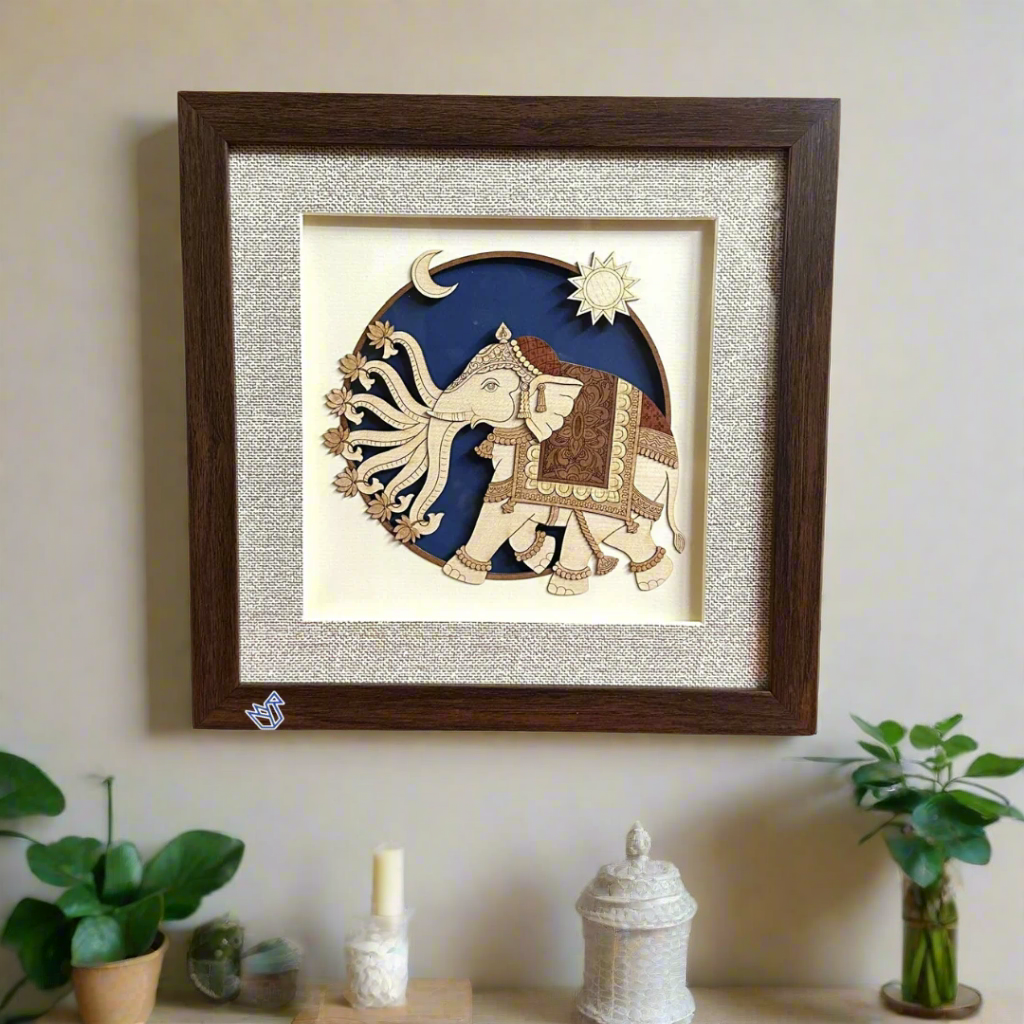 Framed artwork of two elephants with decorative elements on a white background