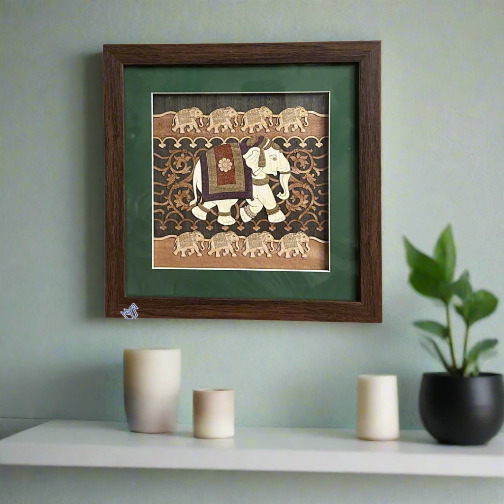 Framed artwork with elephants and a decorative background on a white background