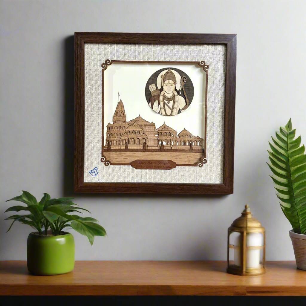 Framed artwork with a temple design and a portrait of a deity on a white background