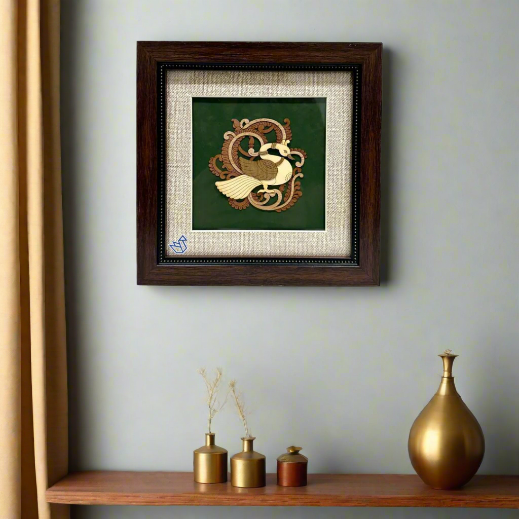 Framed decorative piece with a central emblem on a green background