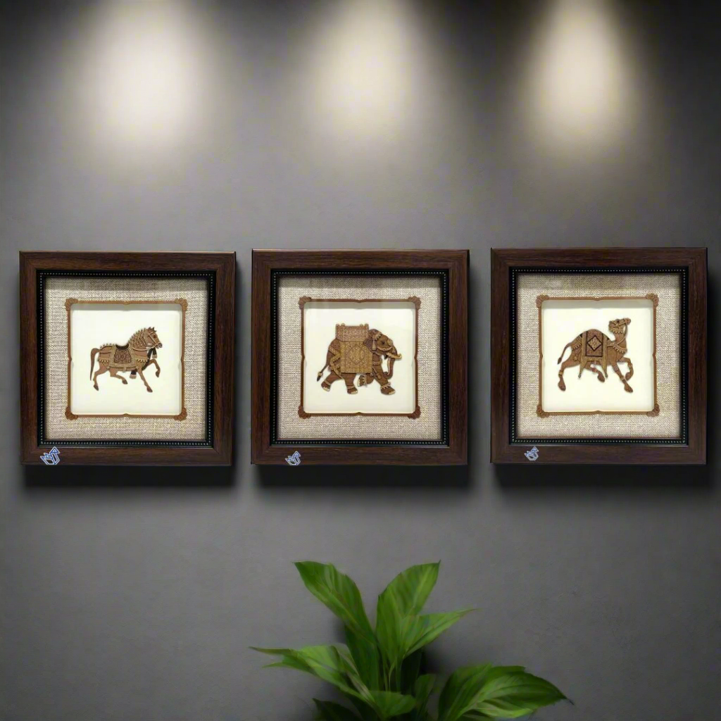 Three framed wall art pieces with animal illustrations on a white background