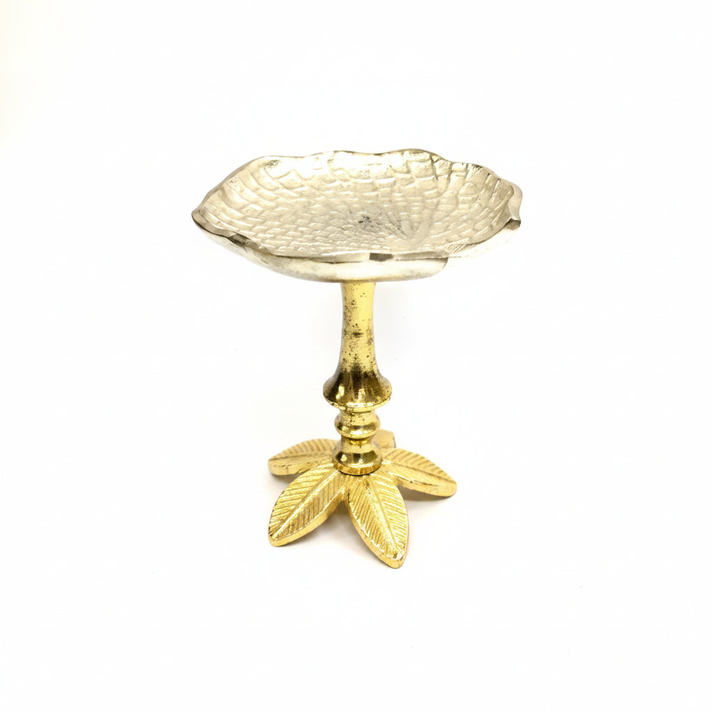 A decorative pedestal lamp holder with a textured gold-toned base shaped like leaves and a silver-toned leaf-shaped bowl on top, shown against a plain white background.
