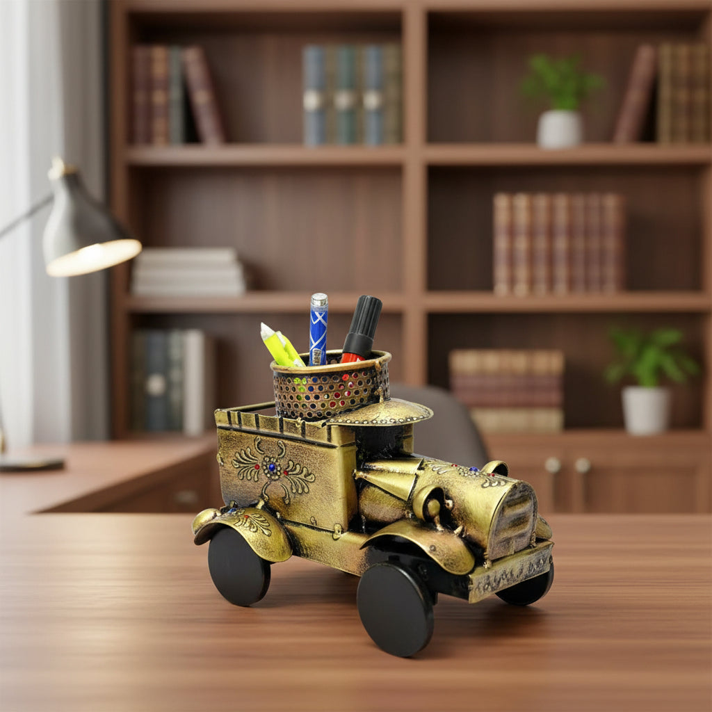 Decorative vintage-style train model with pen holder on a white background