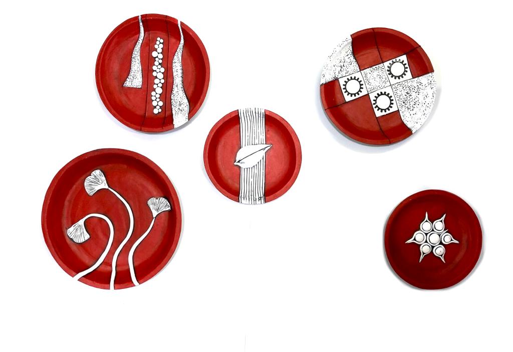 Bold Red Combined With White Floral Accents Hanging Terracotta Plates Tamrapatra