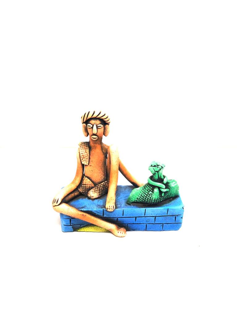 Man Sitting On A Brick Structure Best Collection Of Terracotta By Tamrapatra