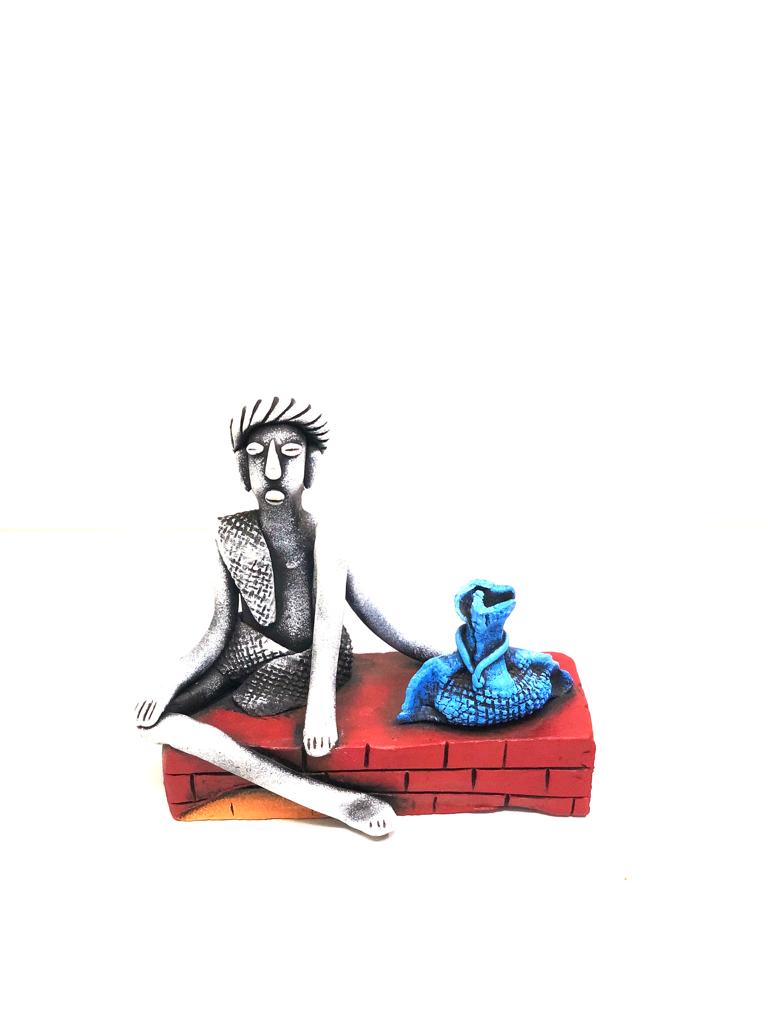 Man Sitting On A Brick Structure Best Collection Of Terracotta By Tamrapatra