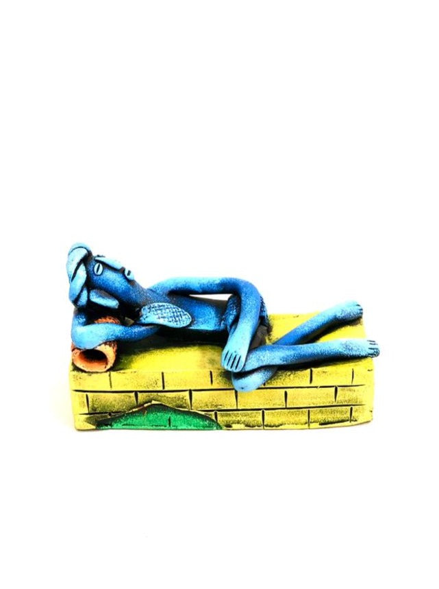 Man Taking Rest On Brick Wall Unique Pottery Presented By Tamrapatra - Tamrapatra