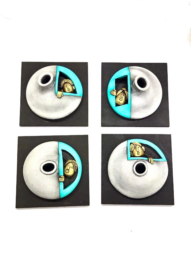 Grey With Turquoise Blue Texture On Creative Peeking Faces In Set Of 4 By Tamrapatra