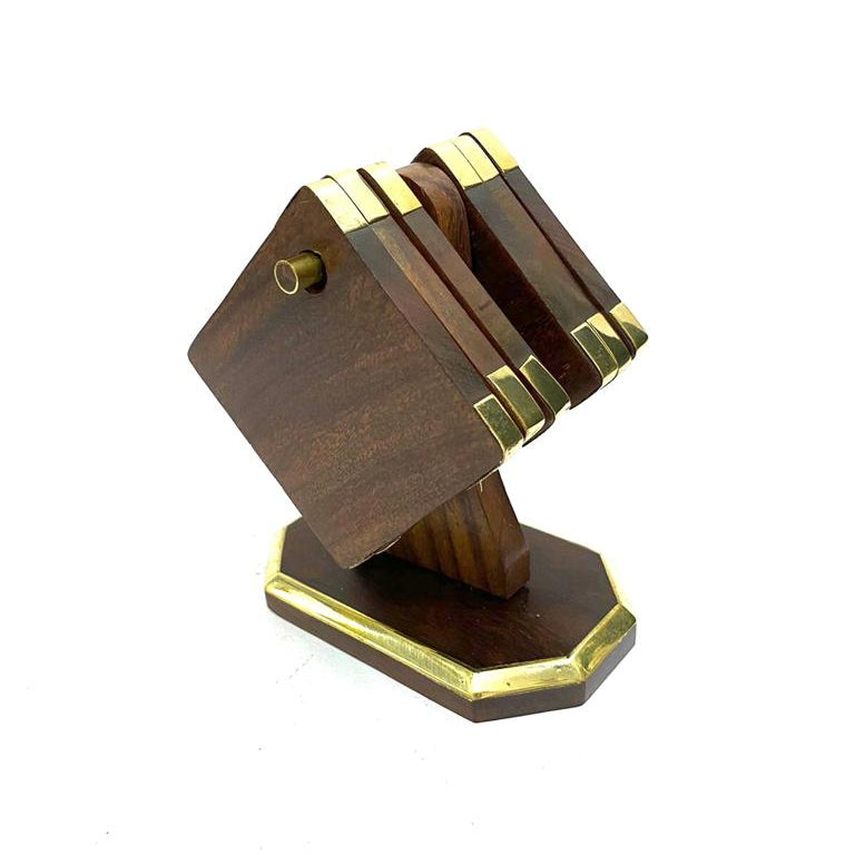 A wooden tea coaster holder with a geometric design, featuring a dark finish on a light wood background.
