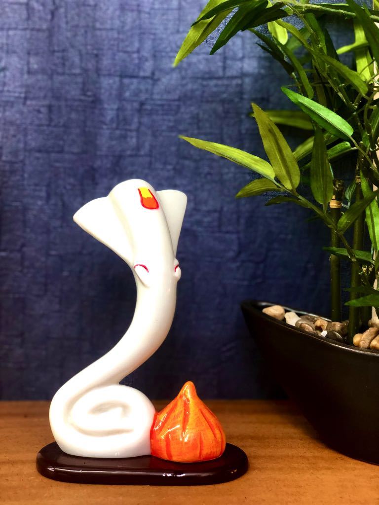 Ganesha With Modak In Sleek 3 Styles White Resin From Tamrapatra - Tamrapatra