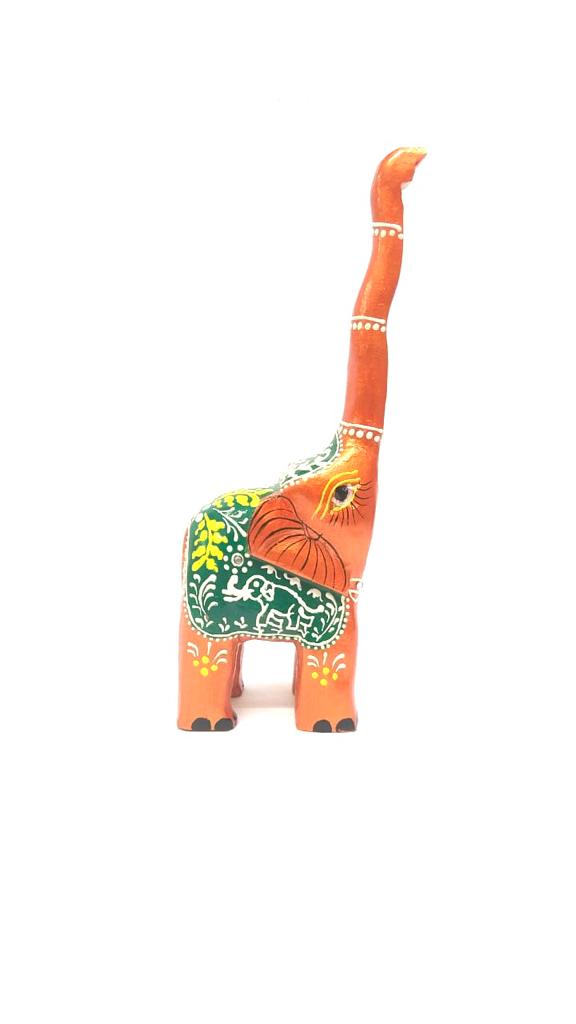 Wooden Long Trunk Elephants In Various Shades Handcrafted From Tamrapatra