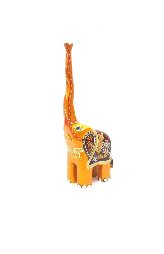 Wooden Long Trunk Elephants In Various Shades Handcrafted From Tamrapatra