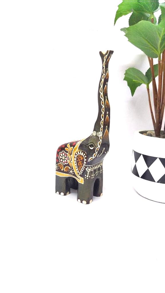 Wooden Long Trunk Elephants In Various Shades Handcrafted From Tamrapatra