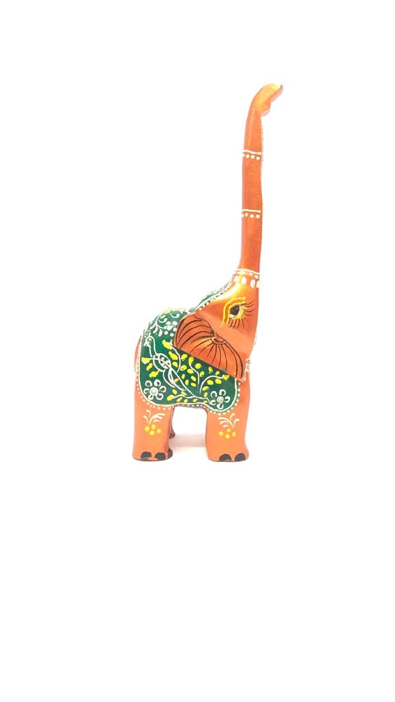 Wooden Long Trunk Elephants In Various Shades Handcrafted From Tamrapatra