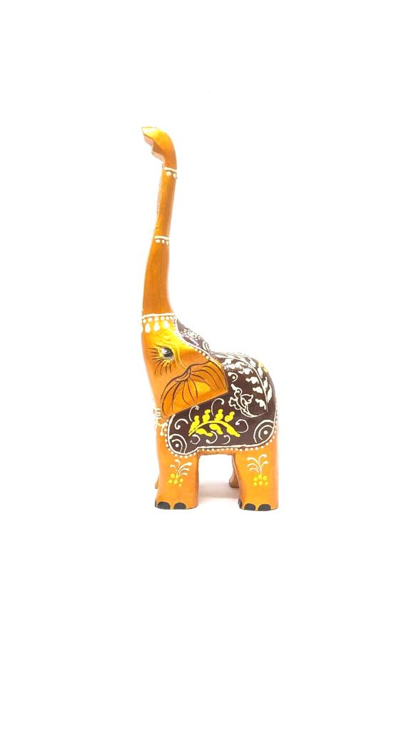 Wooden Long Trunk Elephants In Various Shades Handcrafted From Tamrapatra