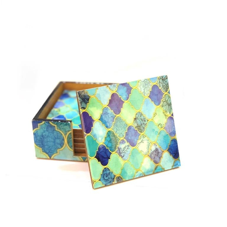 A set of six wood-laminated tea coasters with a geometric pattern in multiple colors.