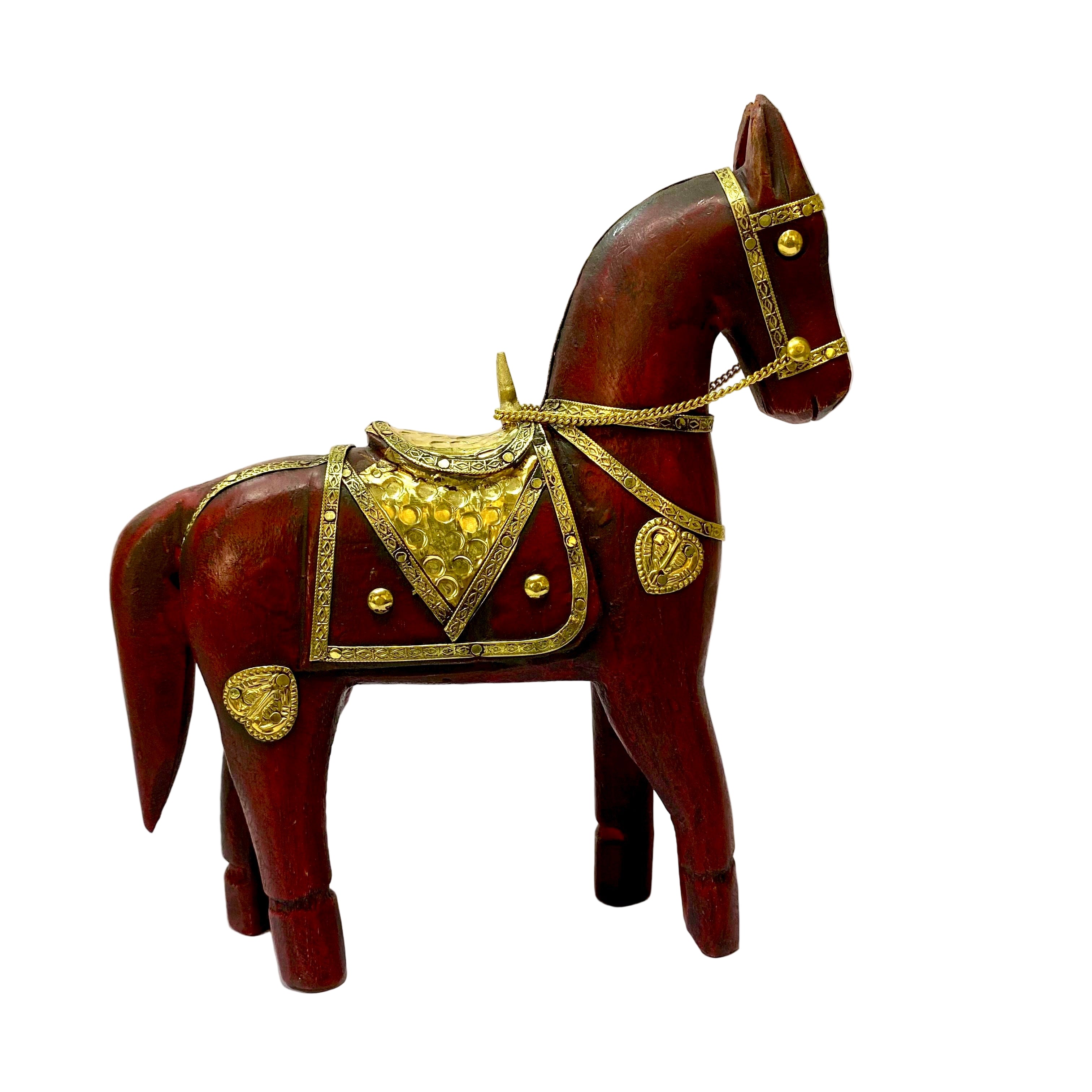 Decorative wooden horse figurine with gold accents on a white background