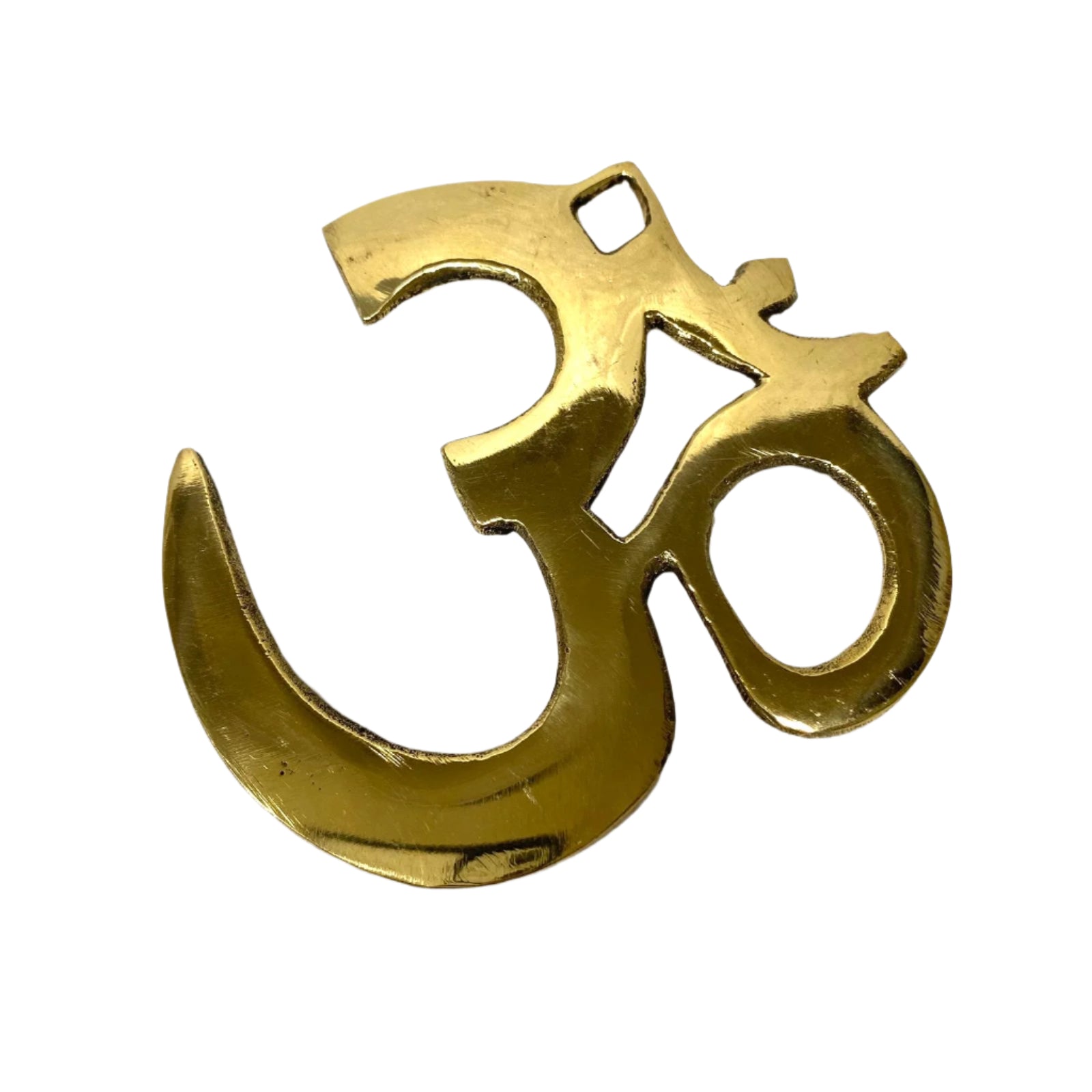 Gold Om symbol pendant on a white background