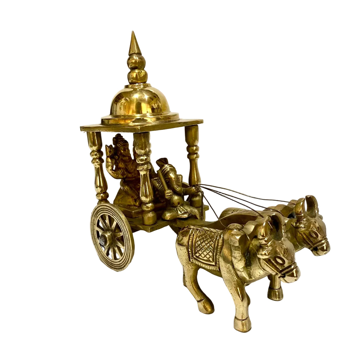 A brass Lord Ganesha cart figurine with two oxen, displayed on a white surface against a plain off-white background.