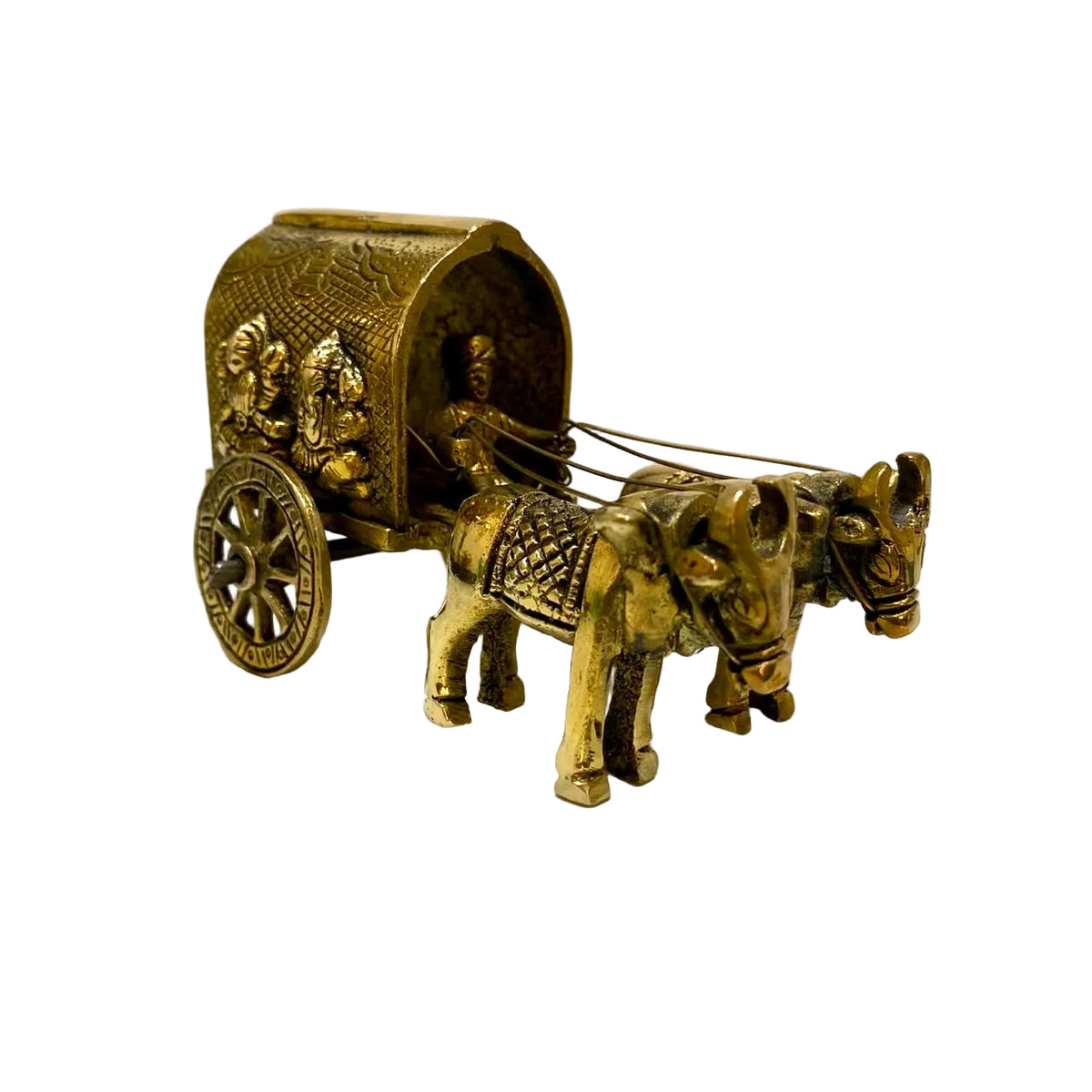 A small brass decorative figurine of an ox-drawn carriage with carved details, shown on a white surface against a plain light background.