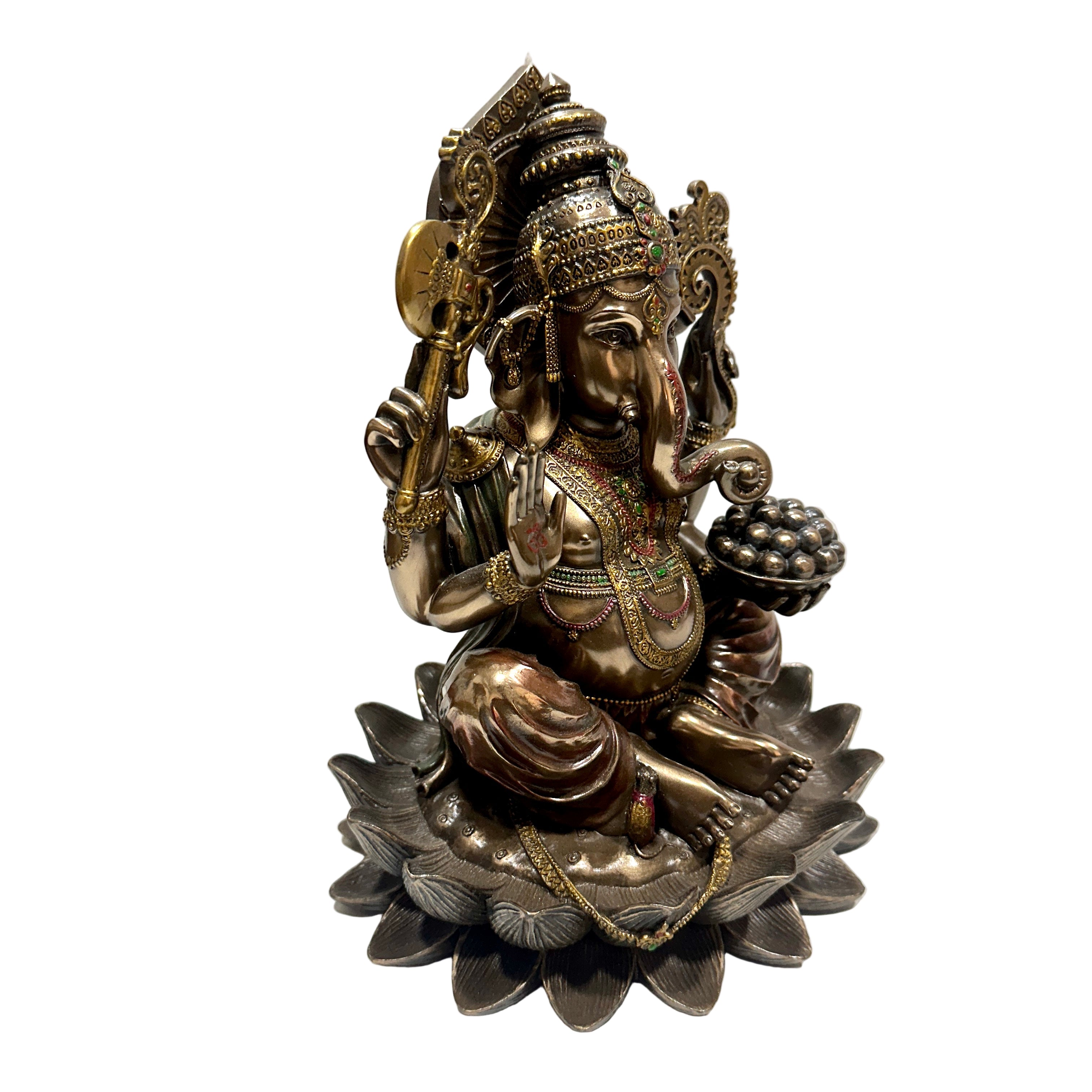 Bronze statue of a deity on a white background