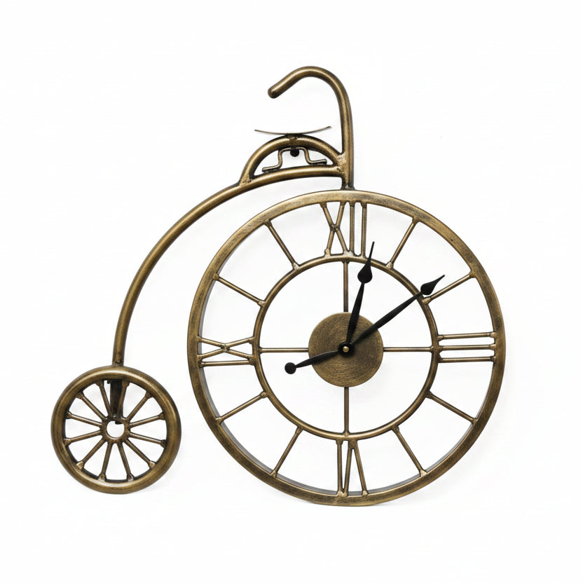 Decorative wall clock shaped like a bicycle on a tiled wall.