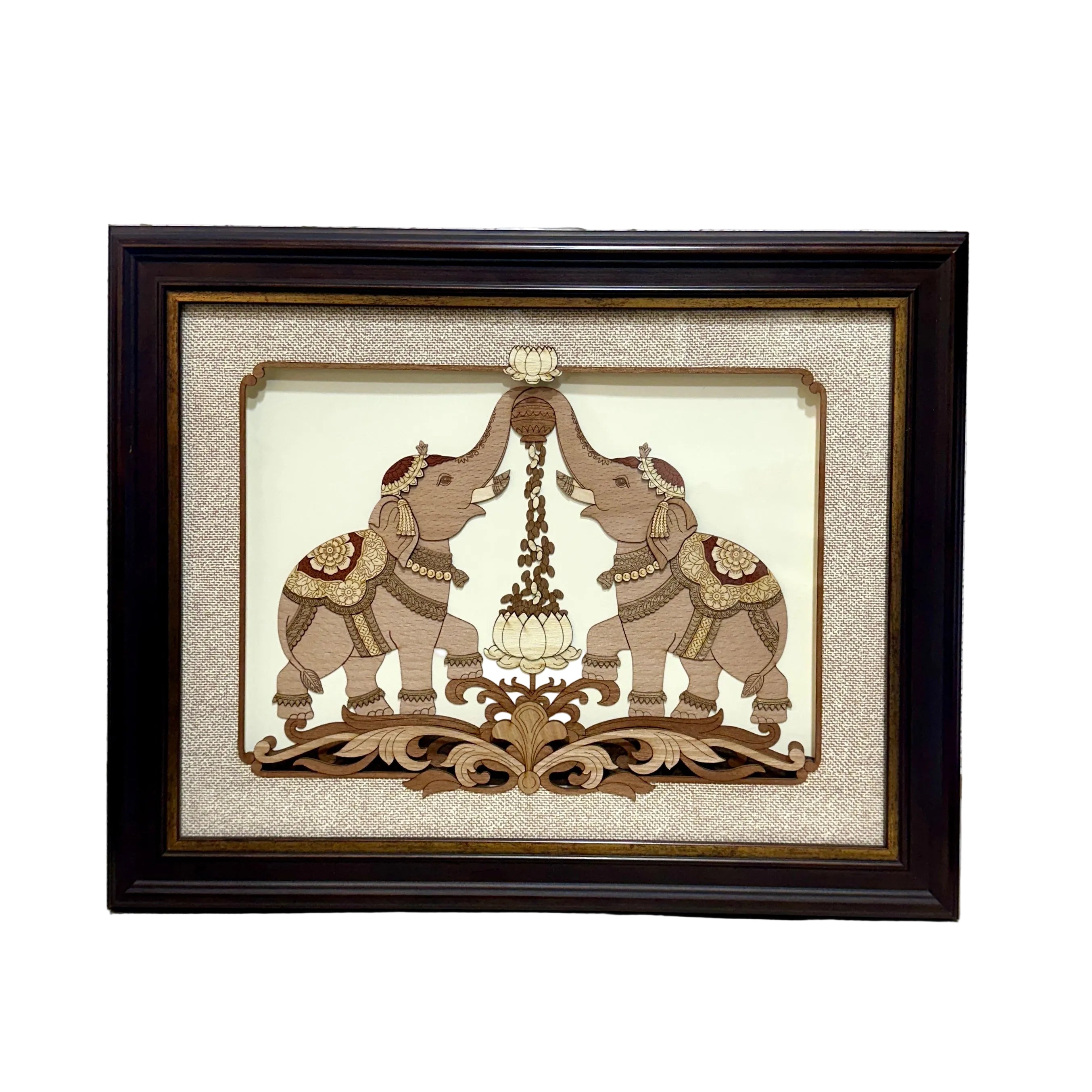 Decorative wall art with two elephants holding a lamp on a textured white background