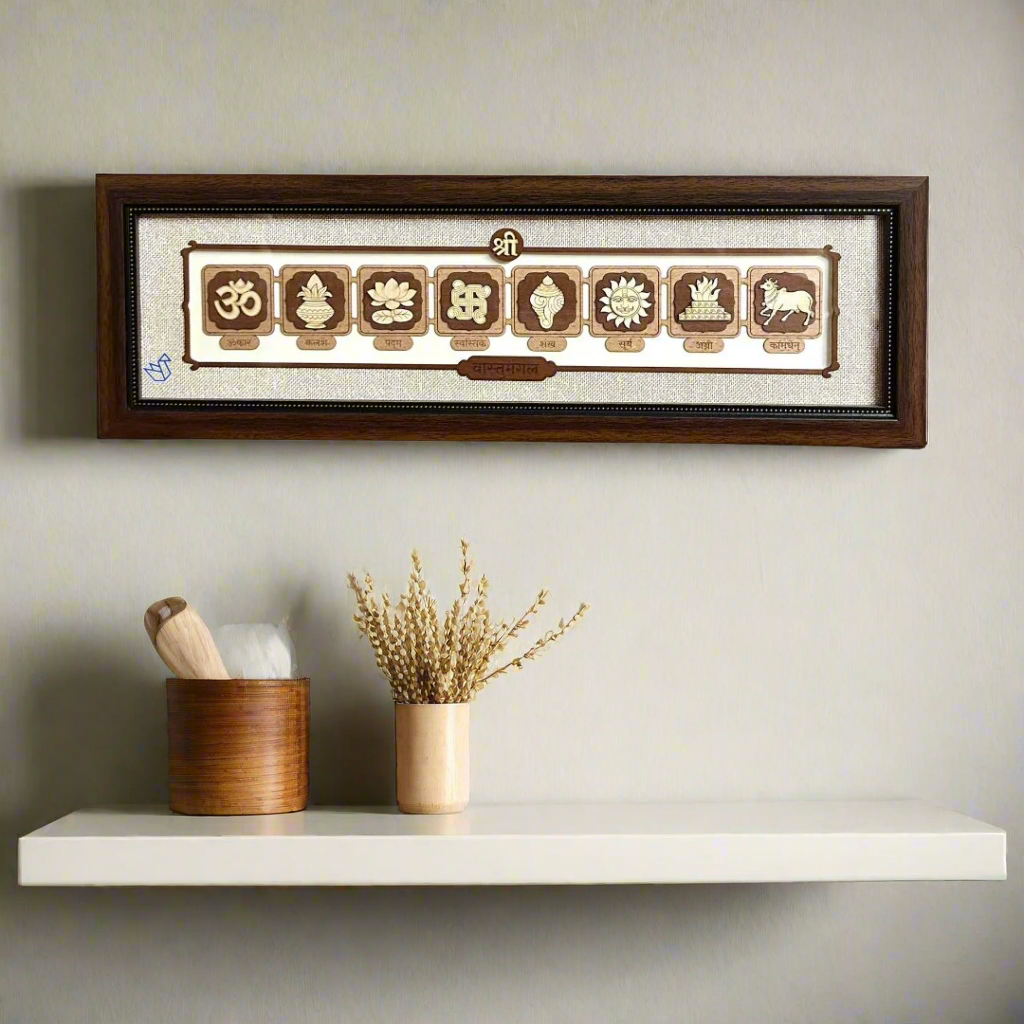Decorative wall art with symbols in a wooden frame on a white background