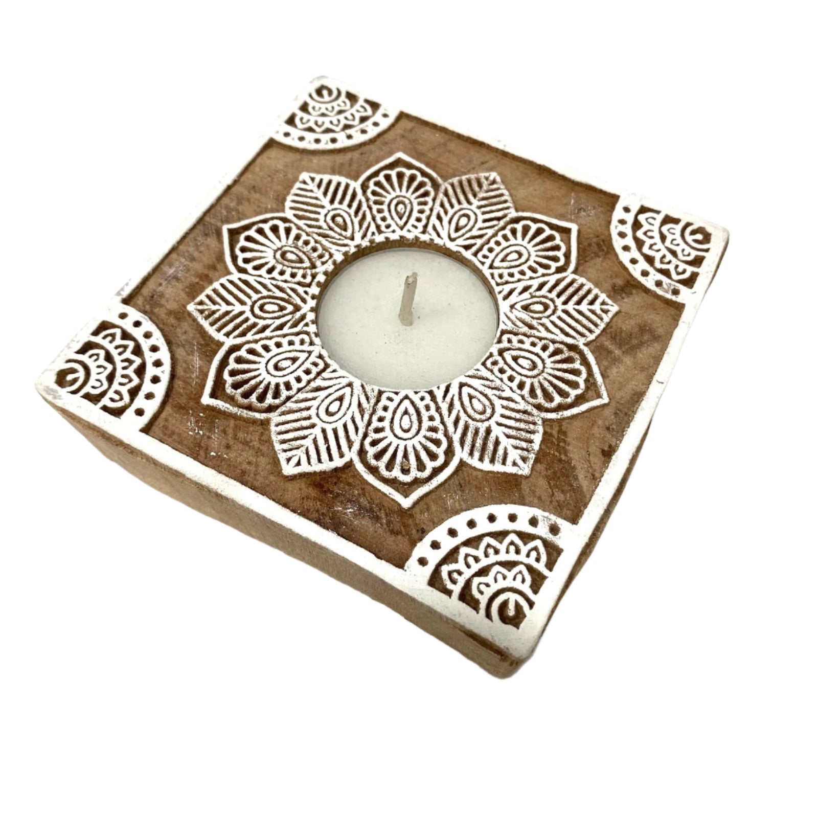 Decorative candle holder with mandala design on a white background
