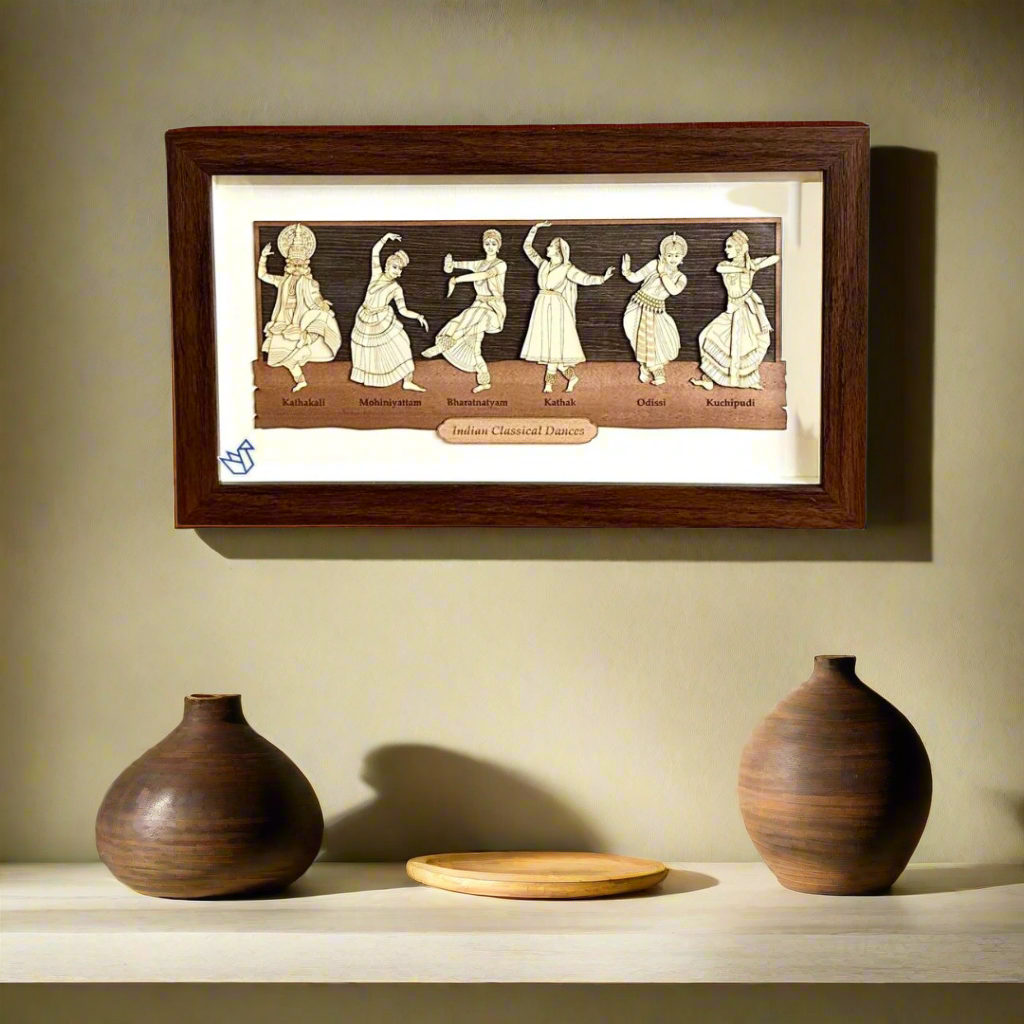 Framed artwork of five dancers in a wooden frame on a white background