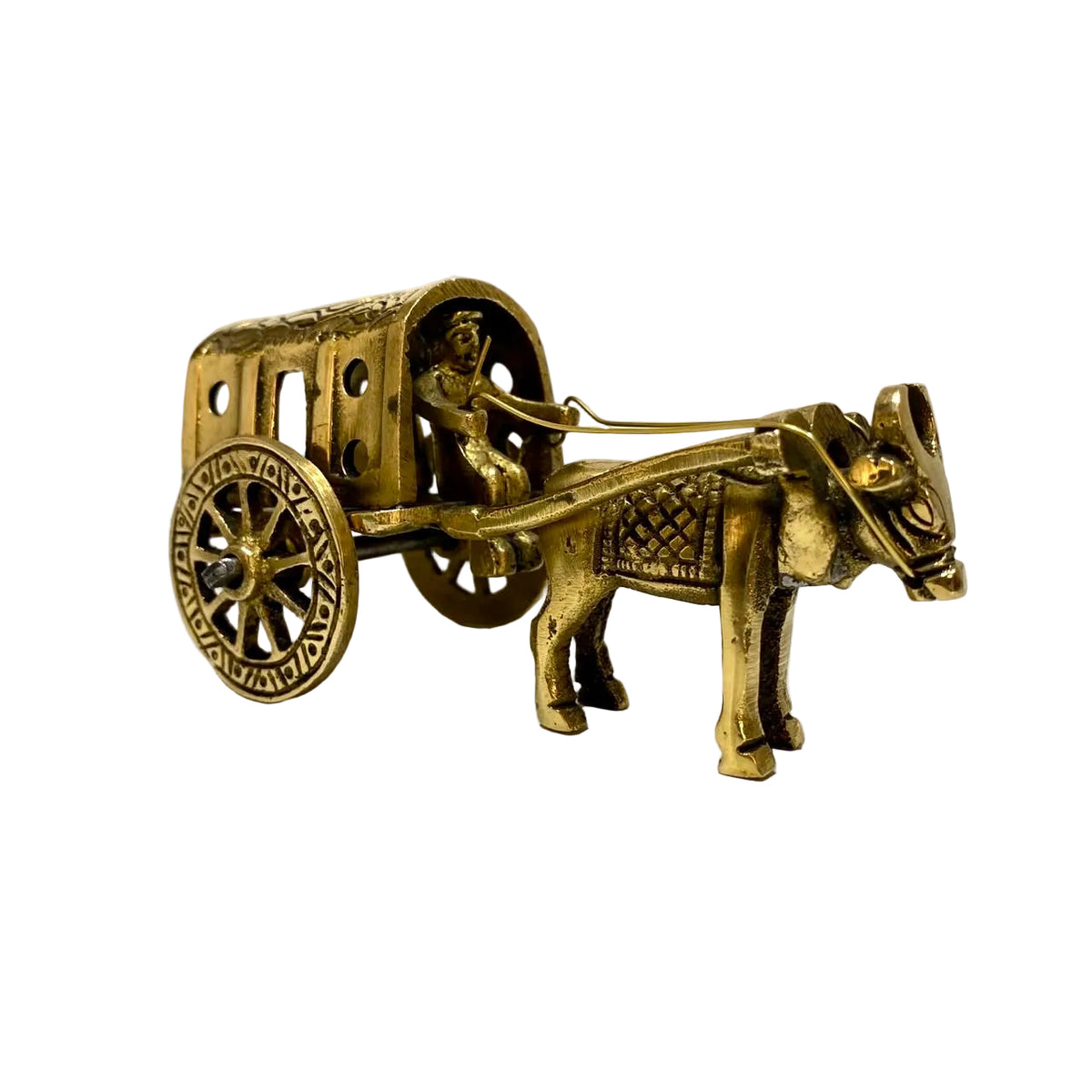 A small brass decorative figurine of an ox-drawn carriage with a driver, shown on a light-colored surface against a plain background.