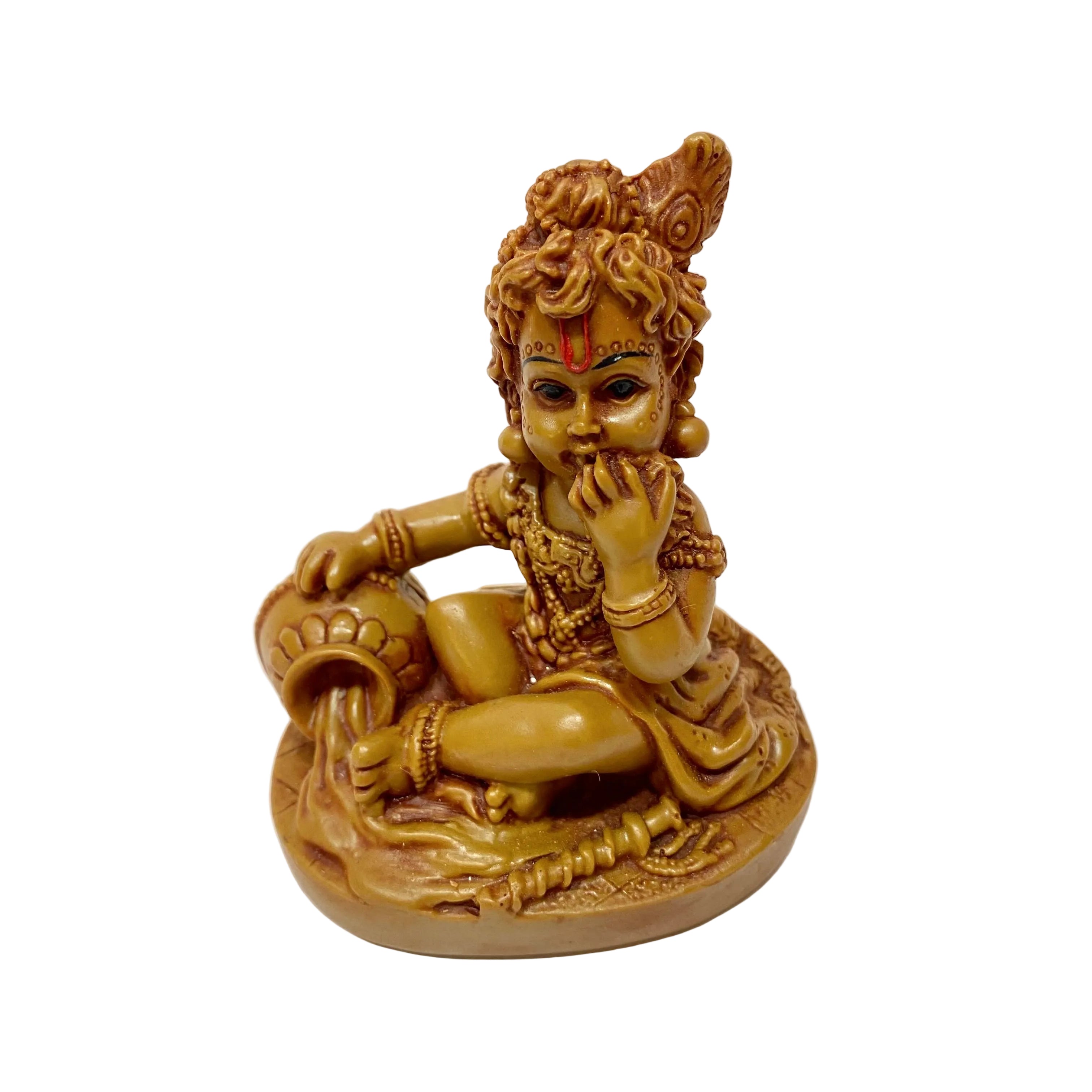 Statue of a seated figure with intricate details on a white background