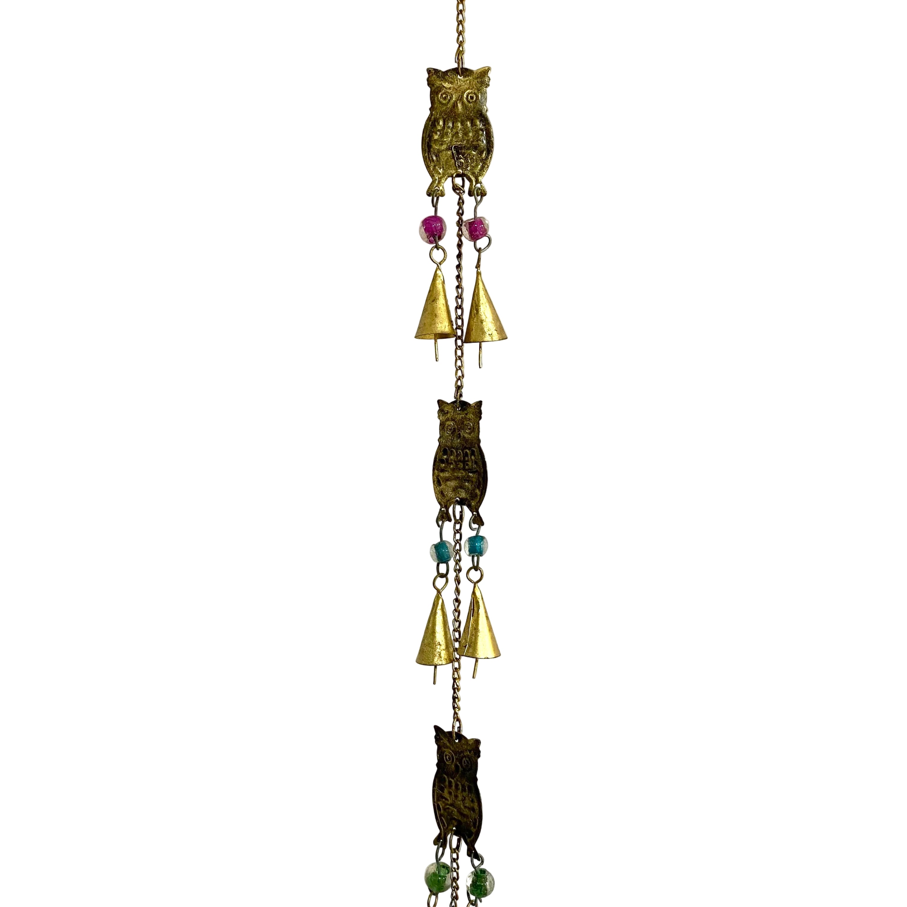 Decorative hanging with owl and bell design on a white background