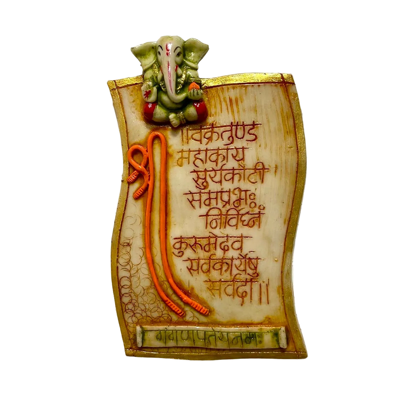 Decorative wall hanging with Ganesha figure and Sanskrit text on a textured white background