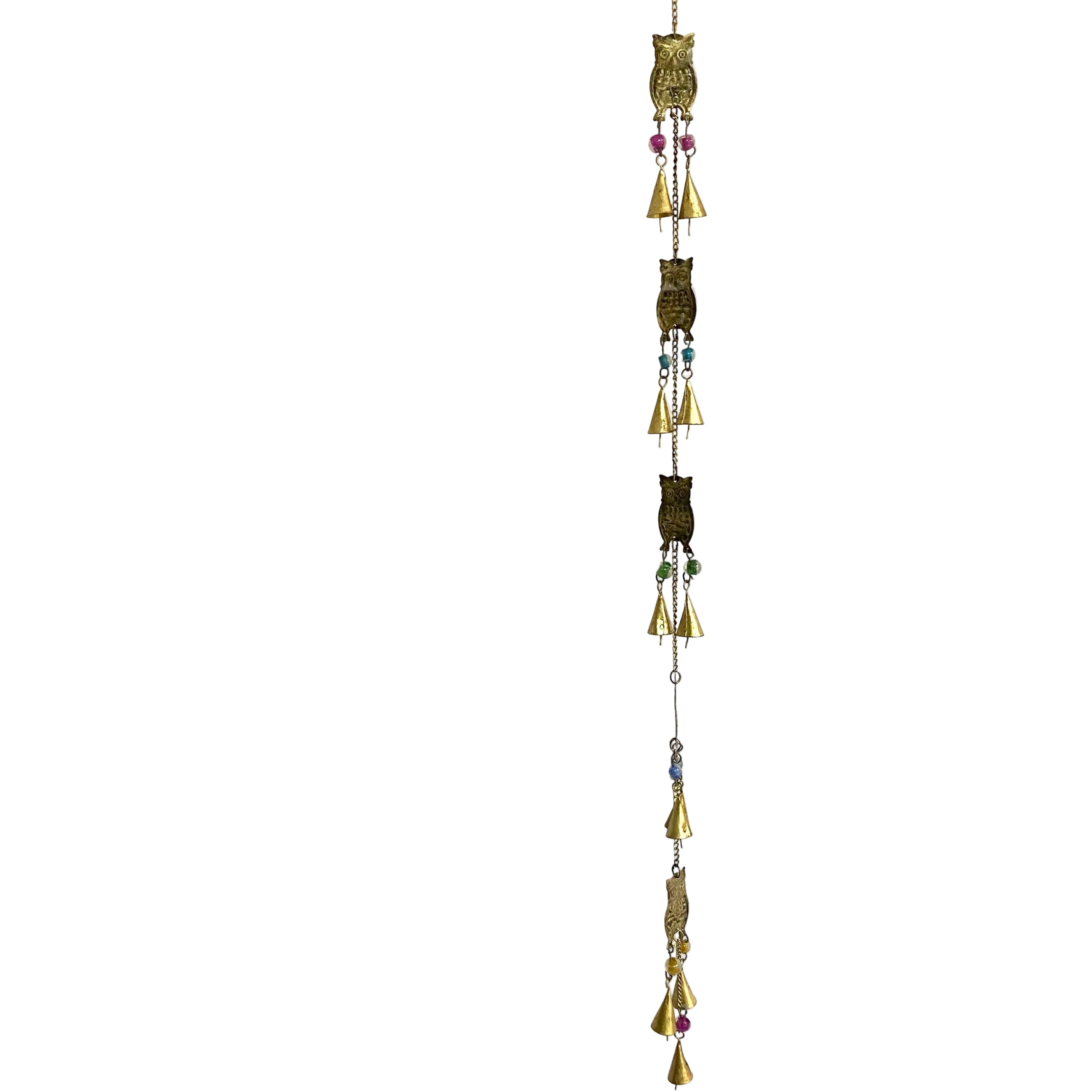 Decorative hanging chain with beads against a white curtain background