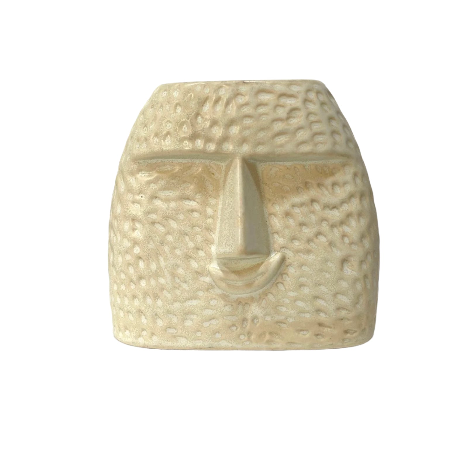 Ceramic face sculpture on a white surface with a white background