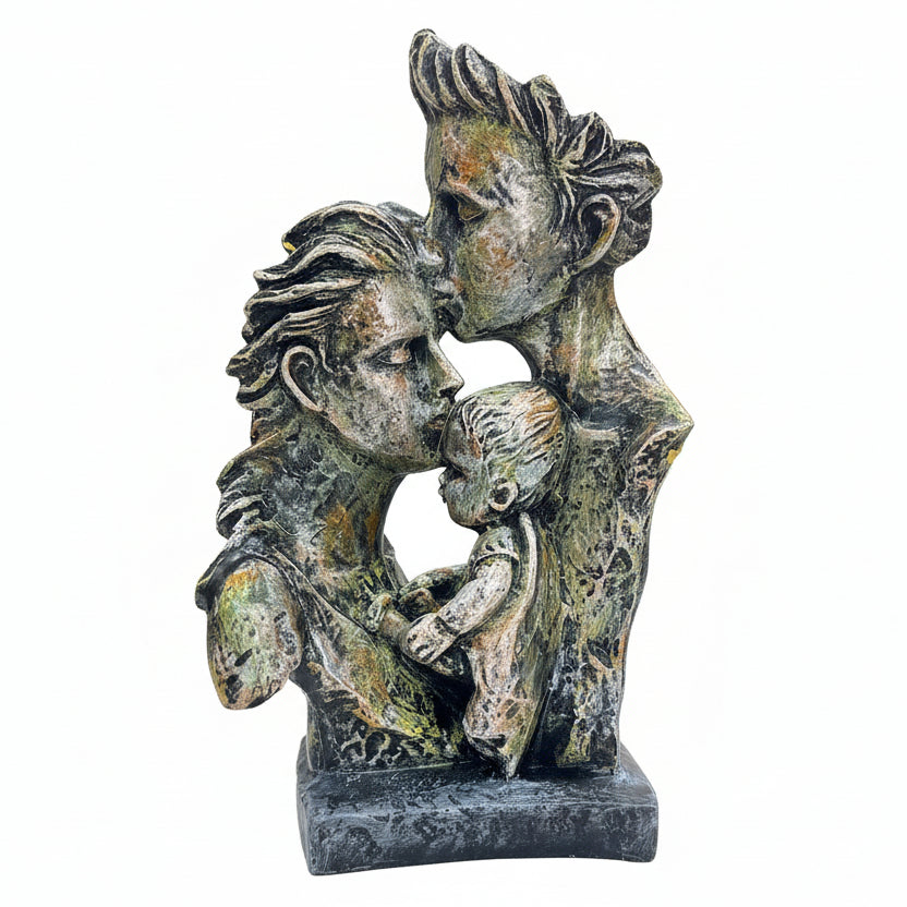 Statue of a couple embracing on a marble base held by a hand, with a blurred indoor background.