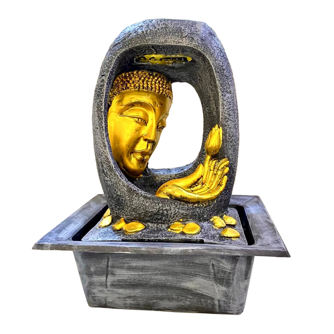 Buddha statue with gold face and hands in a stone base on a white surface.