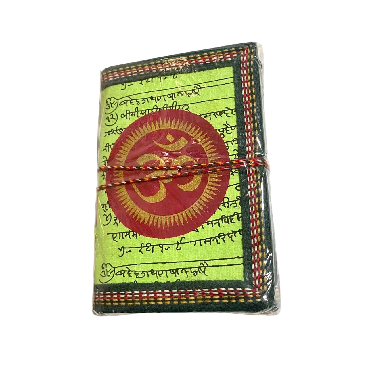 A small folded booklet or prayer card set wrapped in clear plastic, featuring a light green cover with black script, a large red circular emblem with a gold Om symbol in the center, and a dark green stitched border with red and gold accents. The item is tied with a red-and-gold string and photographed on a white surface.