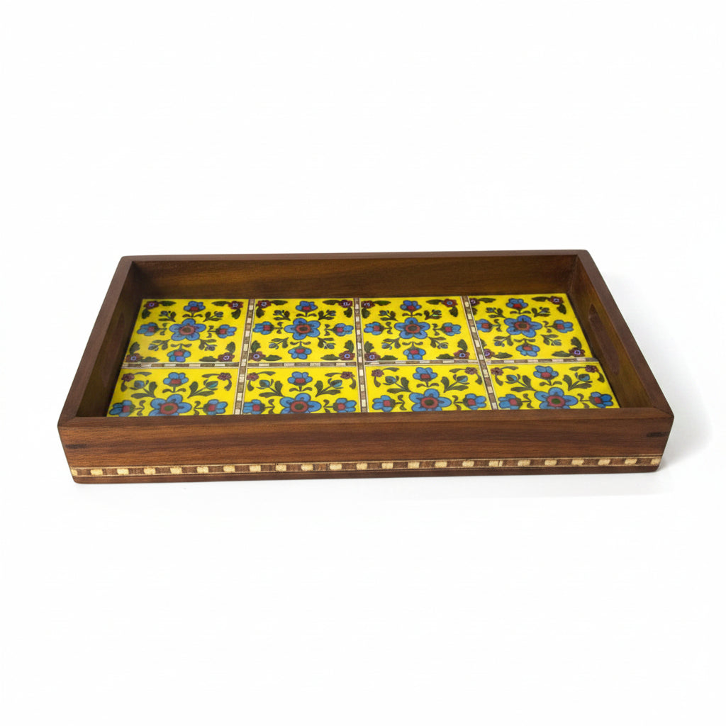 Decorative wooden box with floral tile design on a white surface