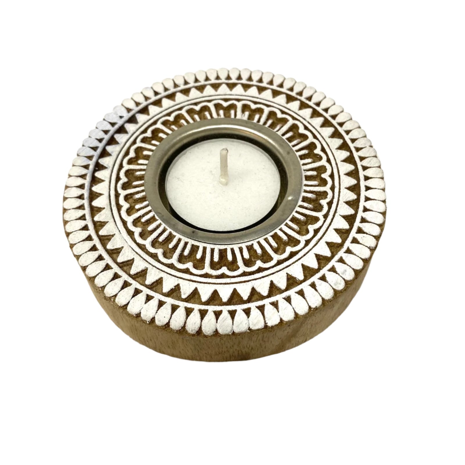 Decorative candle holder with white patterns on a textured white background