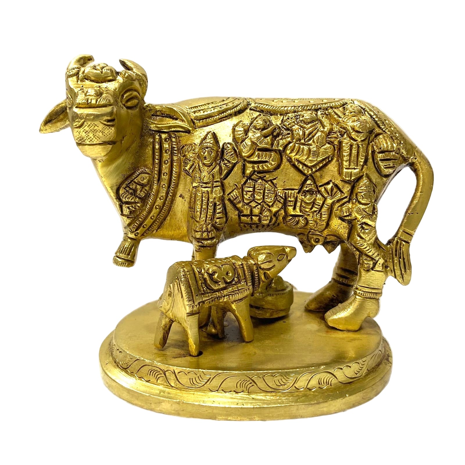 Decorative brass sculpture of a cow and calf on a white background