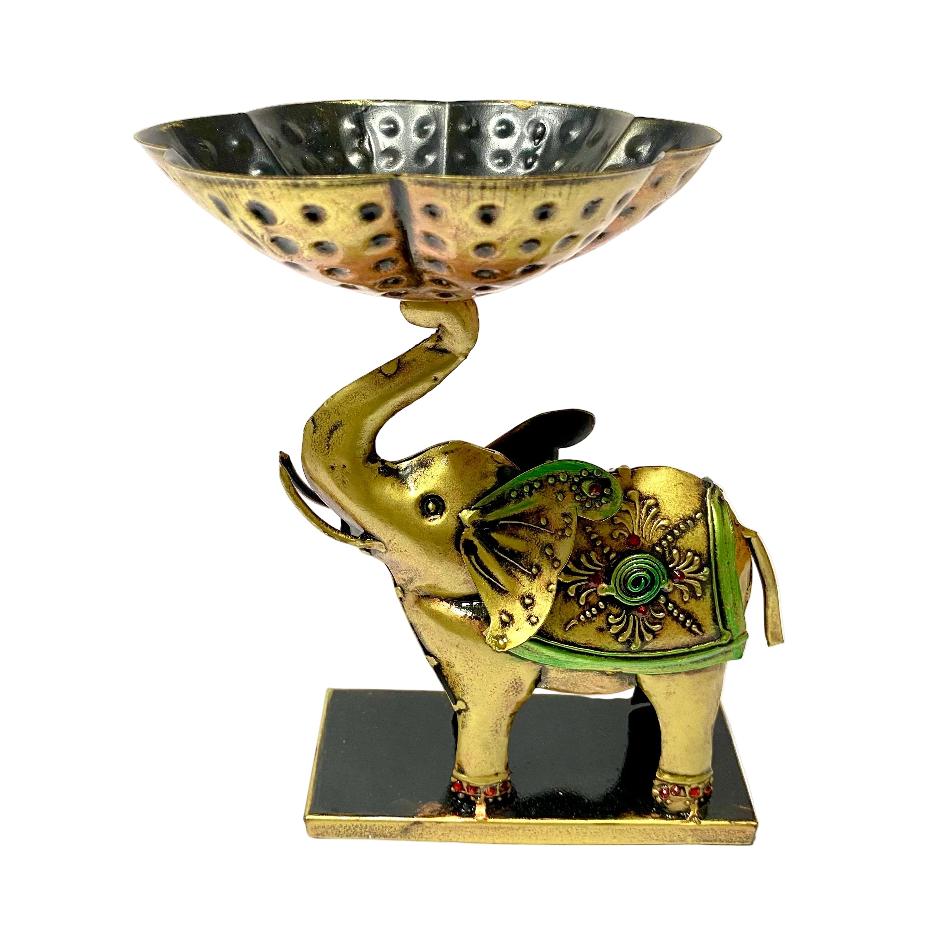 Decorative elephant figurine with a bowl on a white background